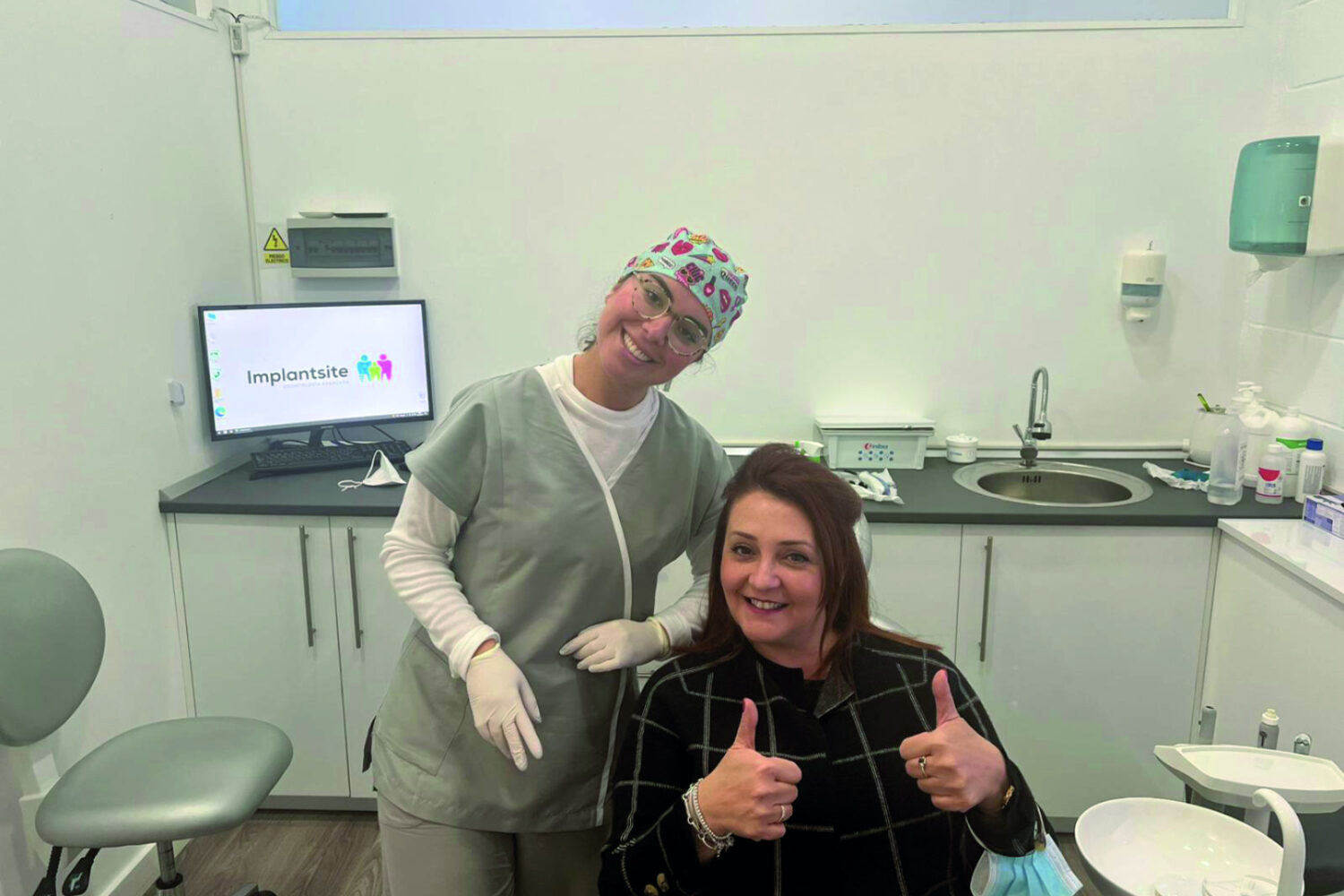 revisión dental higienista y paciente